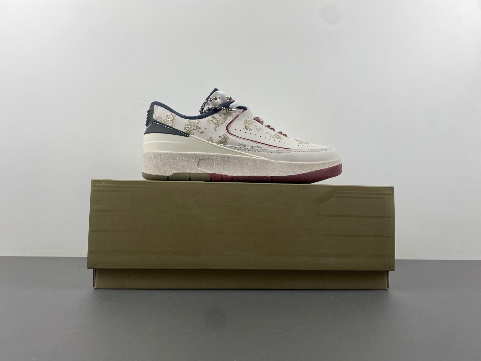 jordan 2 retro low year of the dragon men