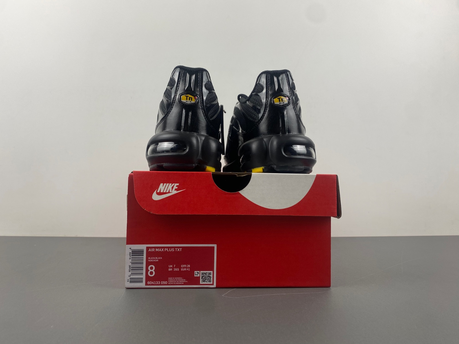 nike air max plus triple black men