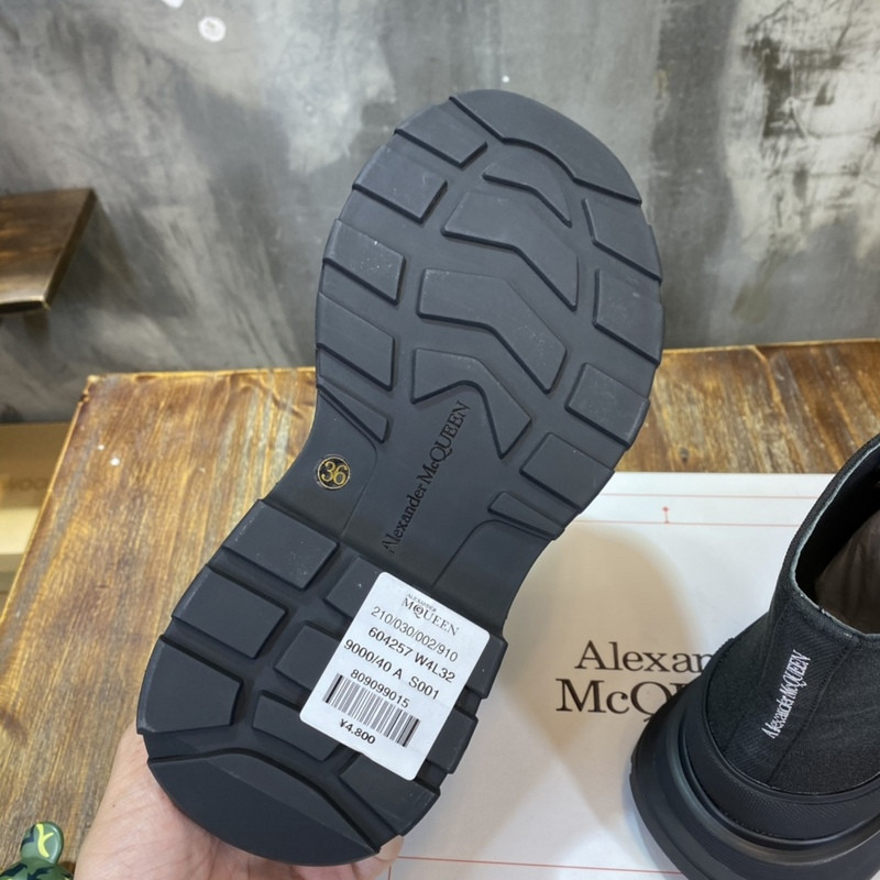 alex mcq tread slick boot in black