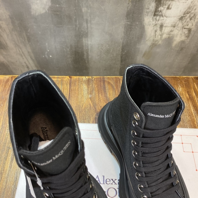 alex mcq tread slick boot in black