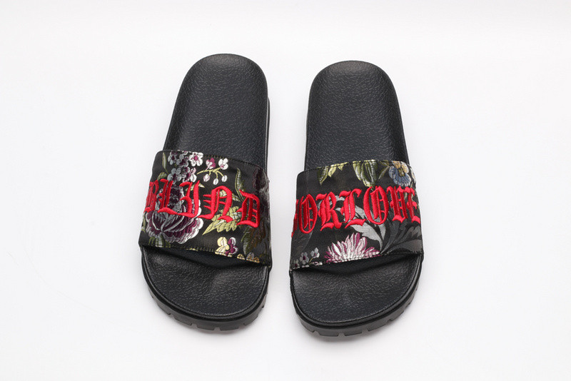 G*u*i slides all black with flower